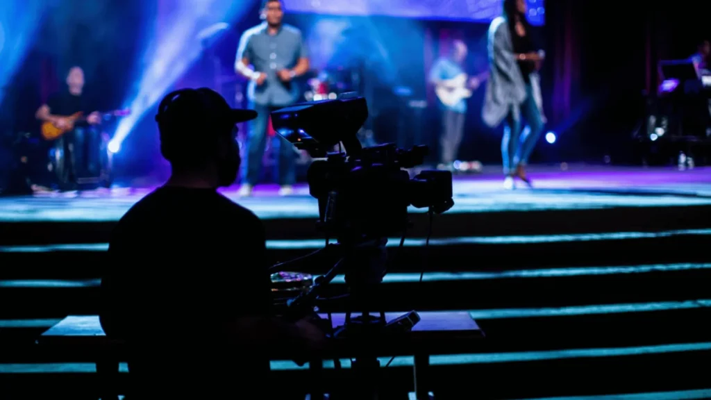 Music video equipment checklist: cinema camera on a gimbal and RGB lights on a Nepali music video set